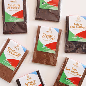 Chocolate bars with sports-themed packaging on a white background