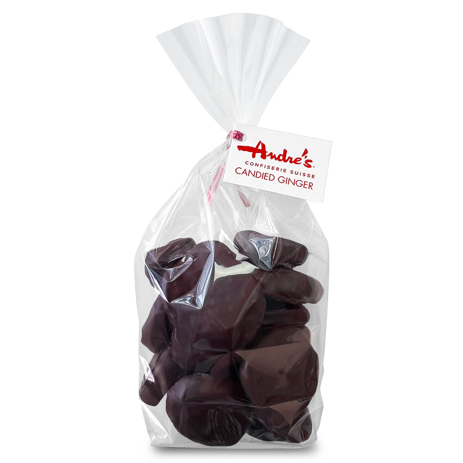 clear bag filled with dark chocolate covered round ginger slices tied with a red & white product tag, and 2 loose candies beside