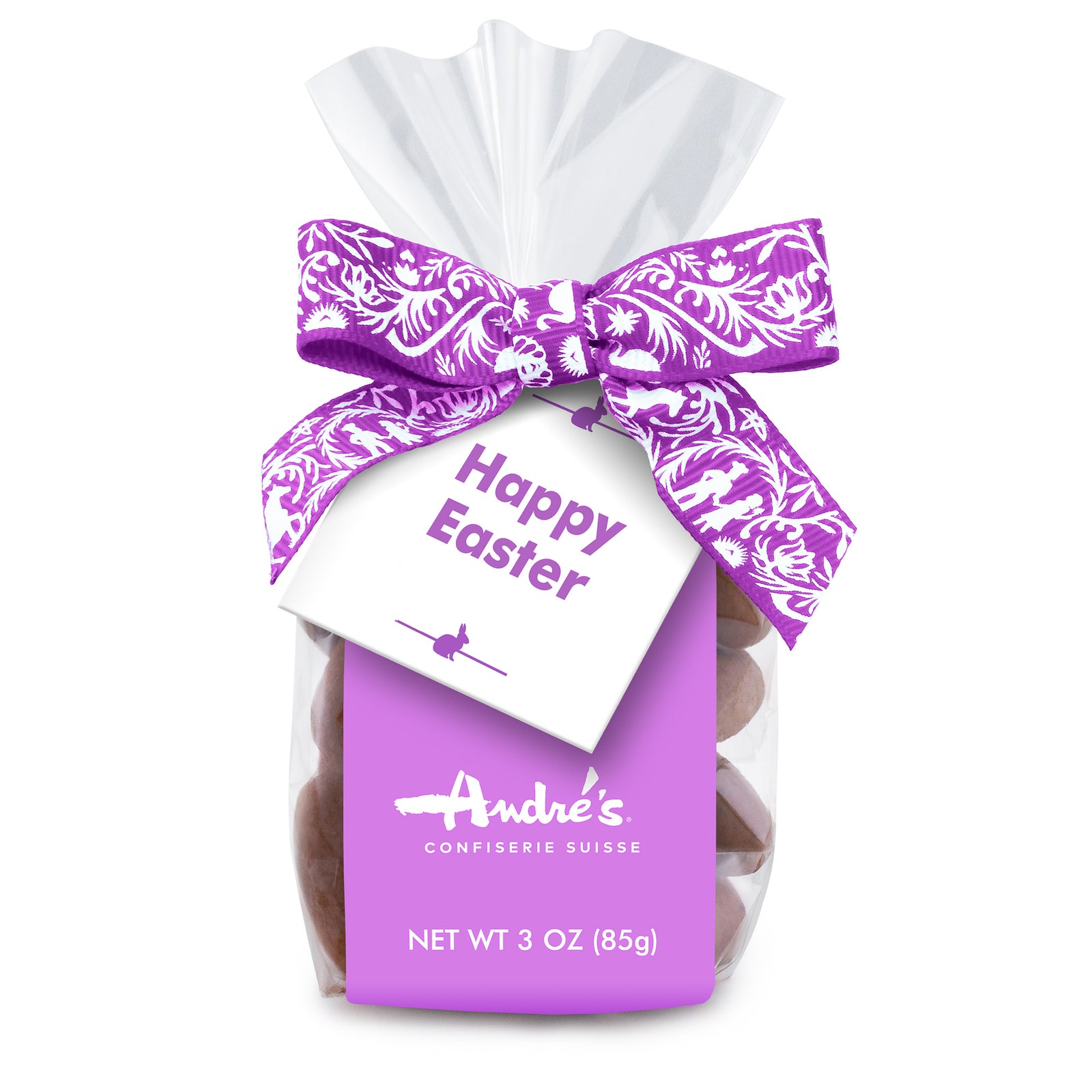 clear bag of dark chocolate covered almonds with lavender Swiss print bow, lavender product label and white hang tag that says "Happy Easter" and features tiny bunny shapes in lavender
