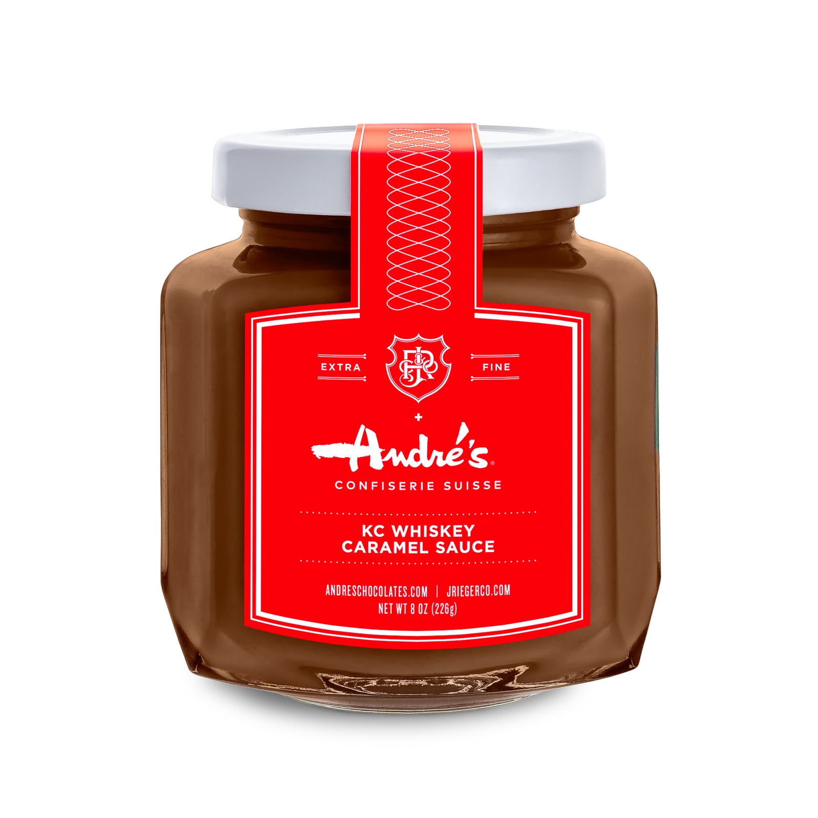 2 clear jars filled with KC Whiskey Caramel Sauce with white lids and red Andre's product labels.