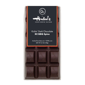 Dark chocolate bar with 'André's' and Q39 packaging on a white background