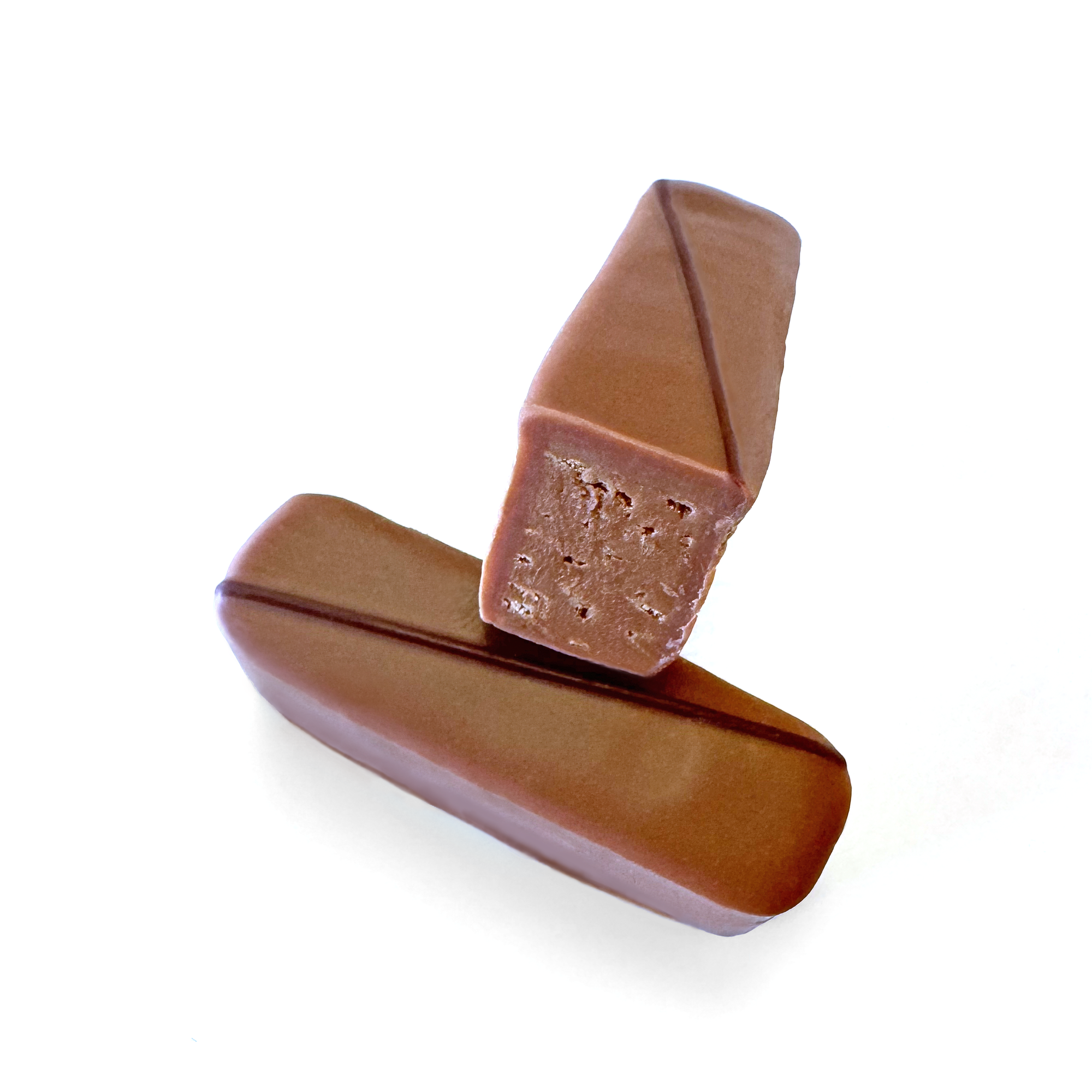 A milk chocolate stick with diagonal design under a stick that has been cut, revealing flakes of crispy crepe inside. 