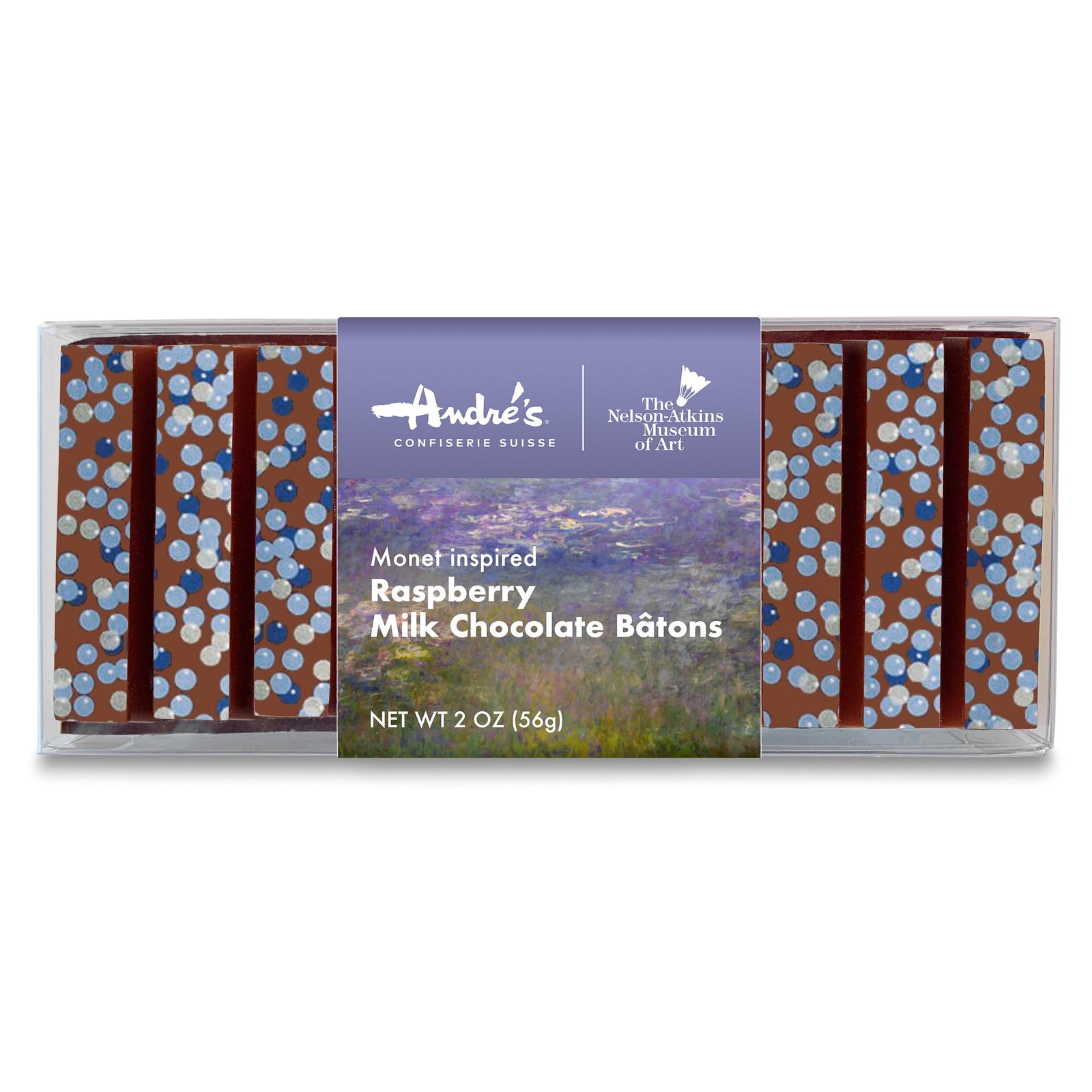 A clear box filled with milk chocolate sticks that have blue circle designs, wrapped with a product label showing Monet's Water Lilies artwork.