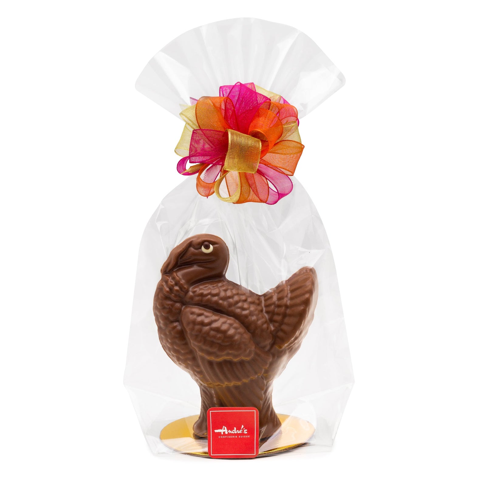 Milk chocolate turkey in a clear bag with autumn colored bow and red Andre's logo sticker.