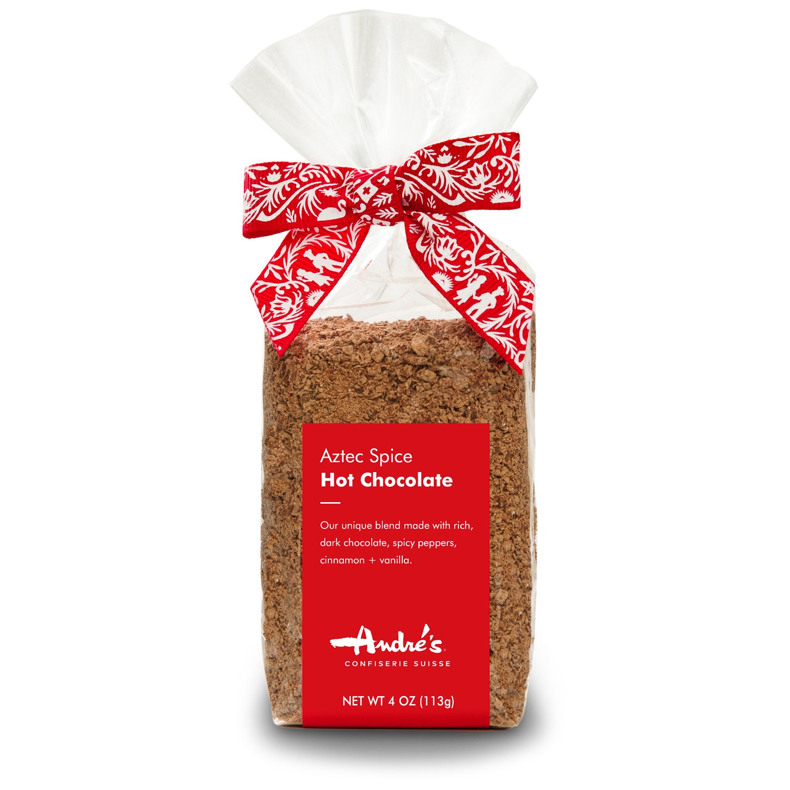 Packaged Aztec Spice Hot Chocolate mix with a red and white bow on top.