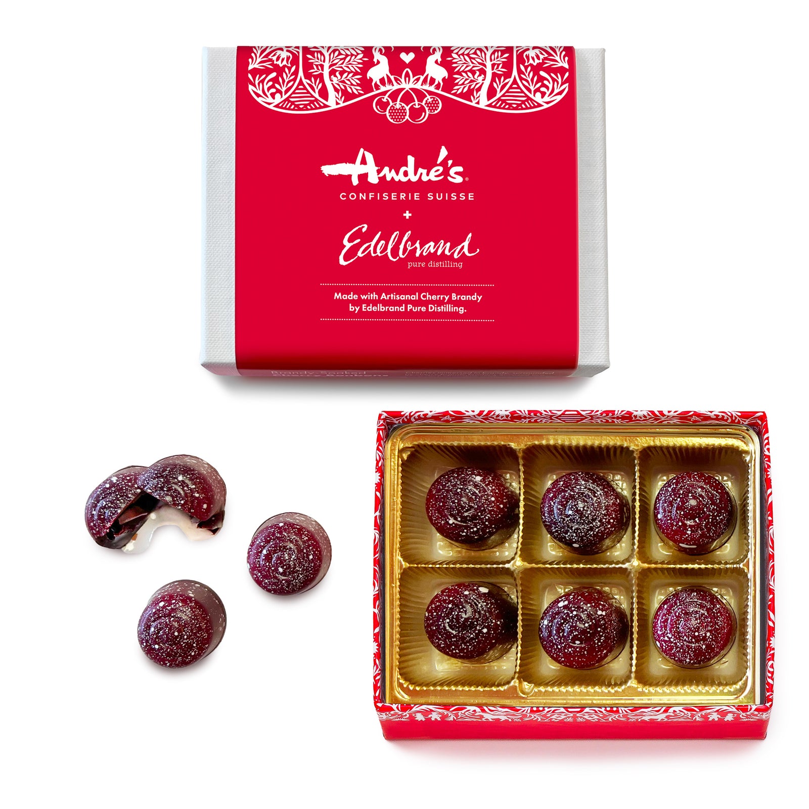 Box with red product label next to an open box with 6 white speckled maroon candies and 3 loose candies beside.