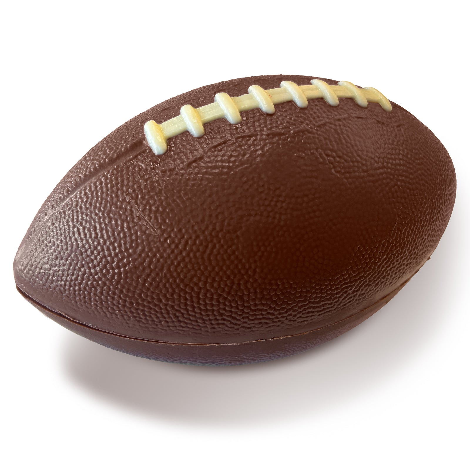 A football shaped shell made of chocolate that has a large bag of powdered sugar coated choclate almonds and red and gold Must See KC disks inside.