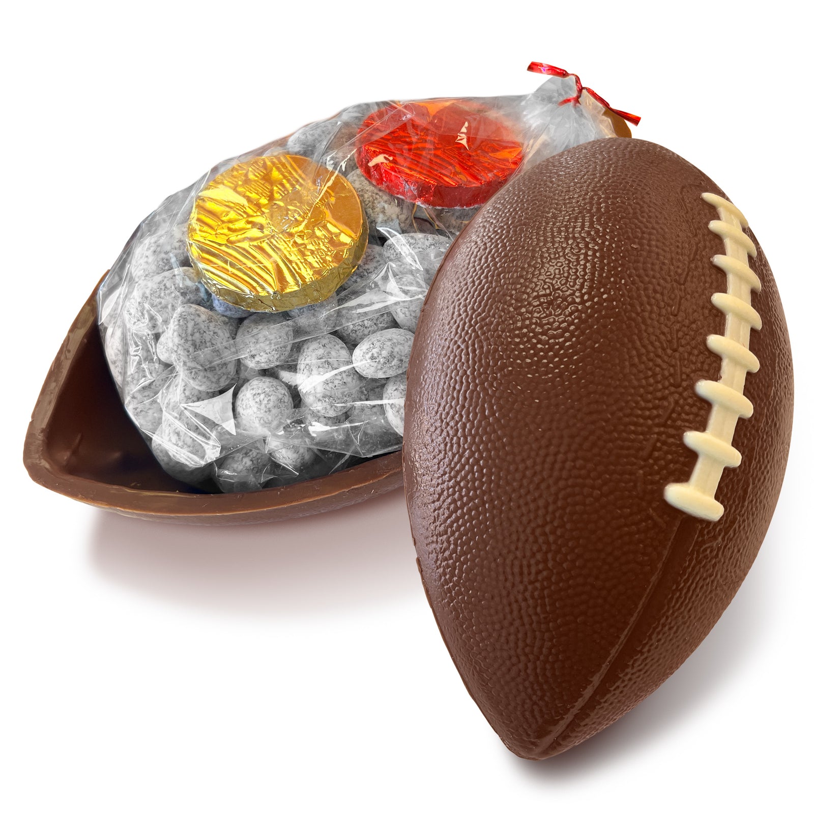 A football shaped shell made of chocolate that has a large bag of powdered sugar coated choclate almonds and red and gold Must See KC disks inside.