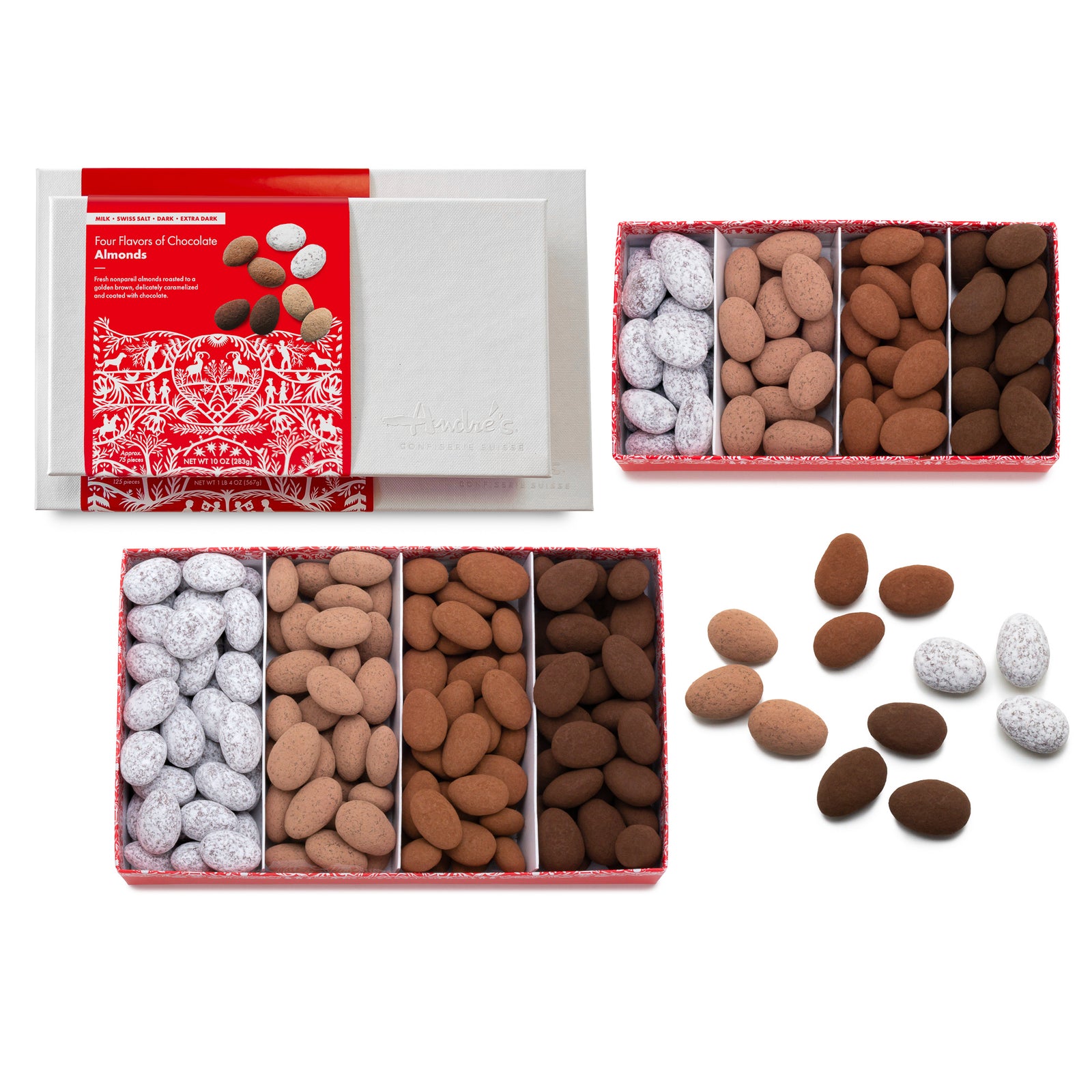 2 white boxes with red Swiss print product labels next to an open box that is divided into 4 sections, each with a different flavor of chocolate covered almonds.