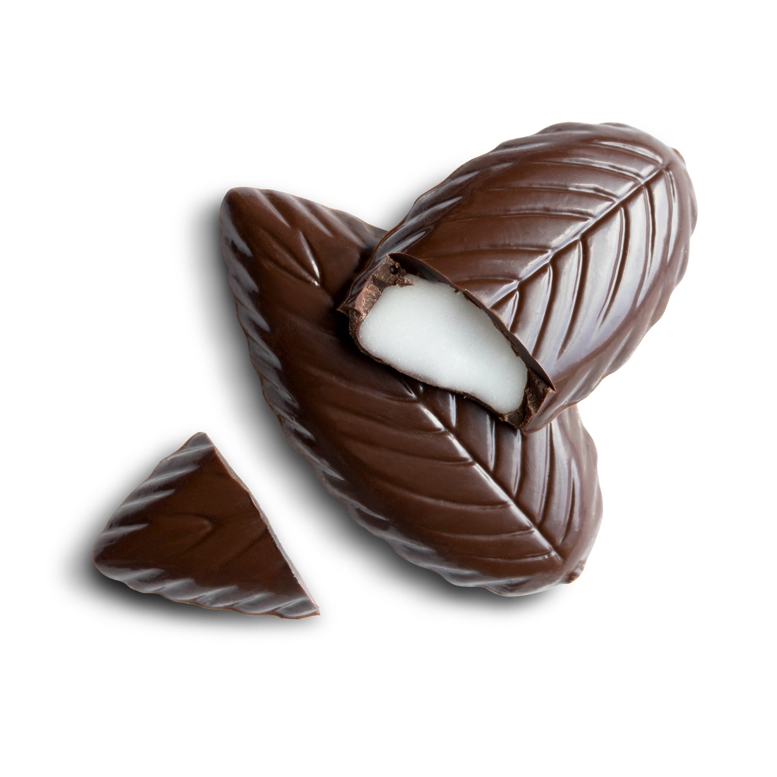 open red box base with 4 dark chocolate mint leaf shaped candies, 2 loose candies beside, and white lid box above with red and white Swiss print product label