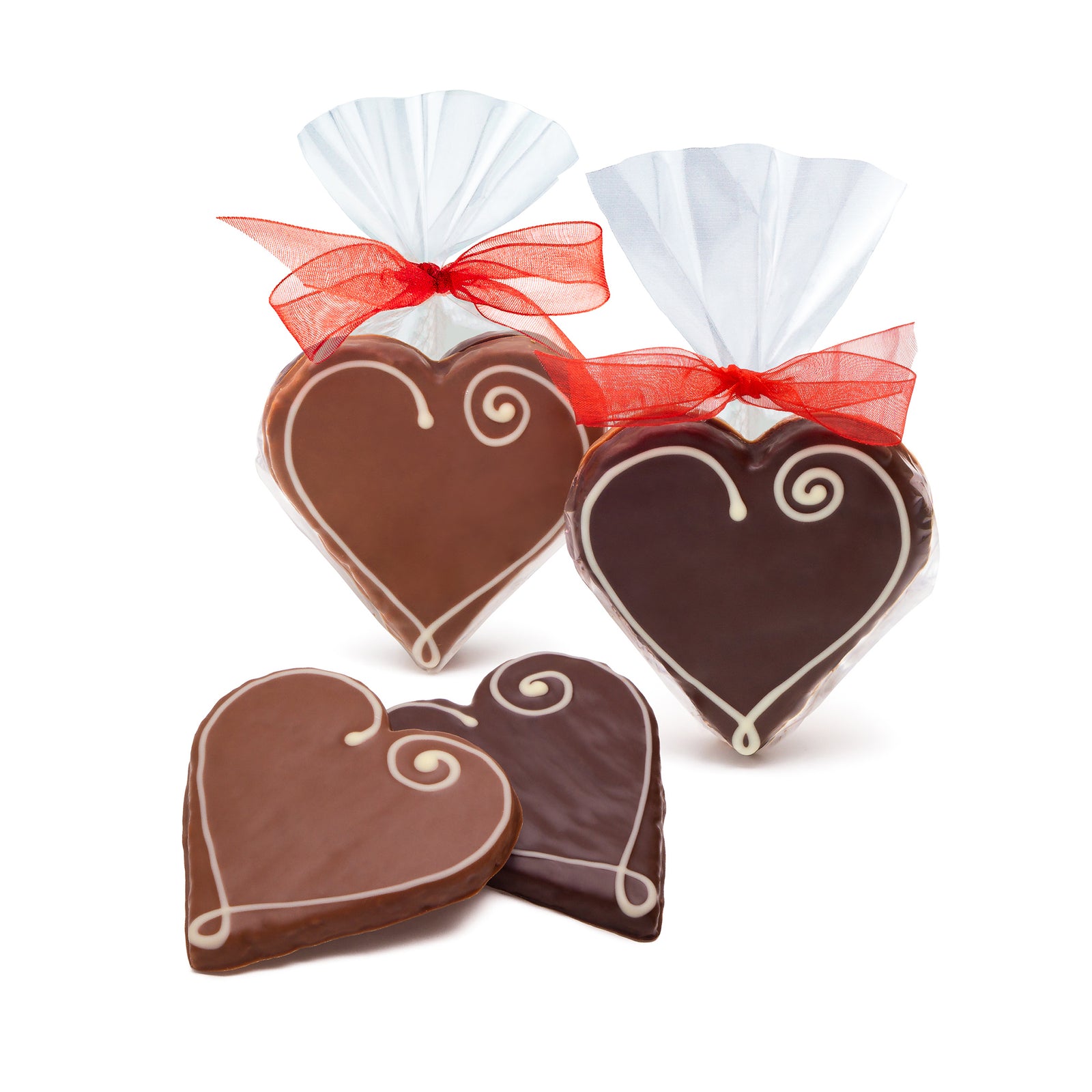 dark chocolate covered heart shaped cookies and milk chocolate heart shaped cookies with white icing heart design. One of each in a clear bag with a red ribbon, and one of each loose.