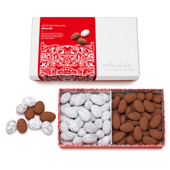White box with red Swiss print product label next to an open box that is divided into 2 sections for milk and dark chocolate covered almonds.