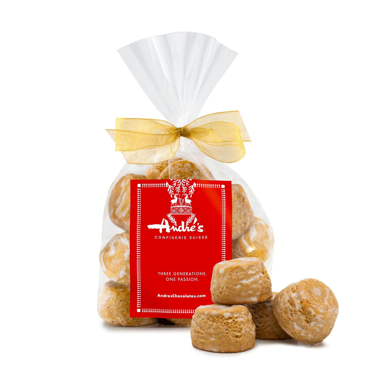 Golden round disk shaped cookies in a clear bag with red product label and gold bow.