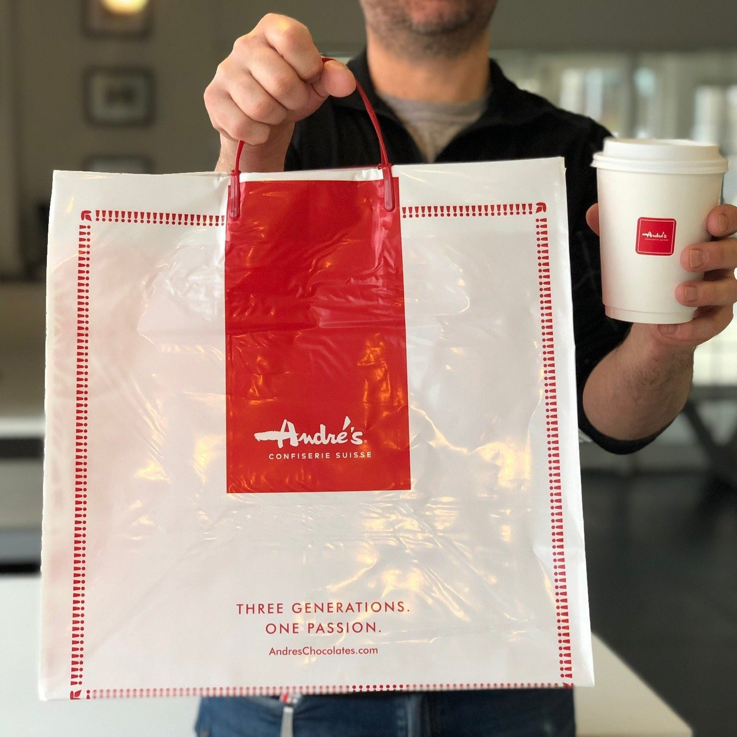 A variety of prepared foods on a table, including two salads, a quiche, and a coffee cake.