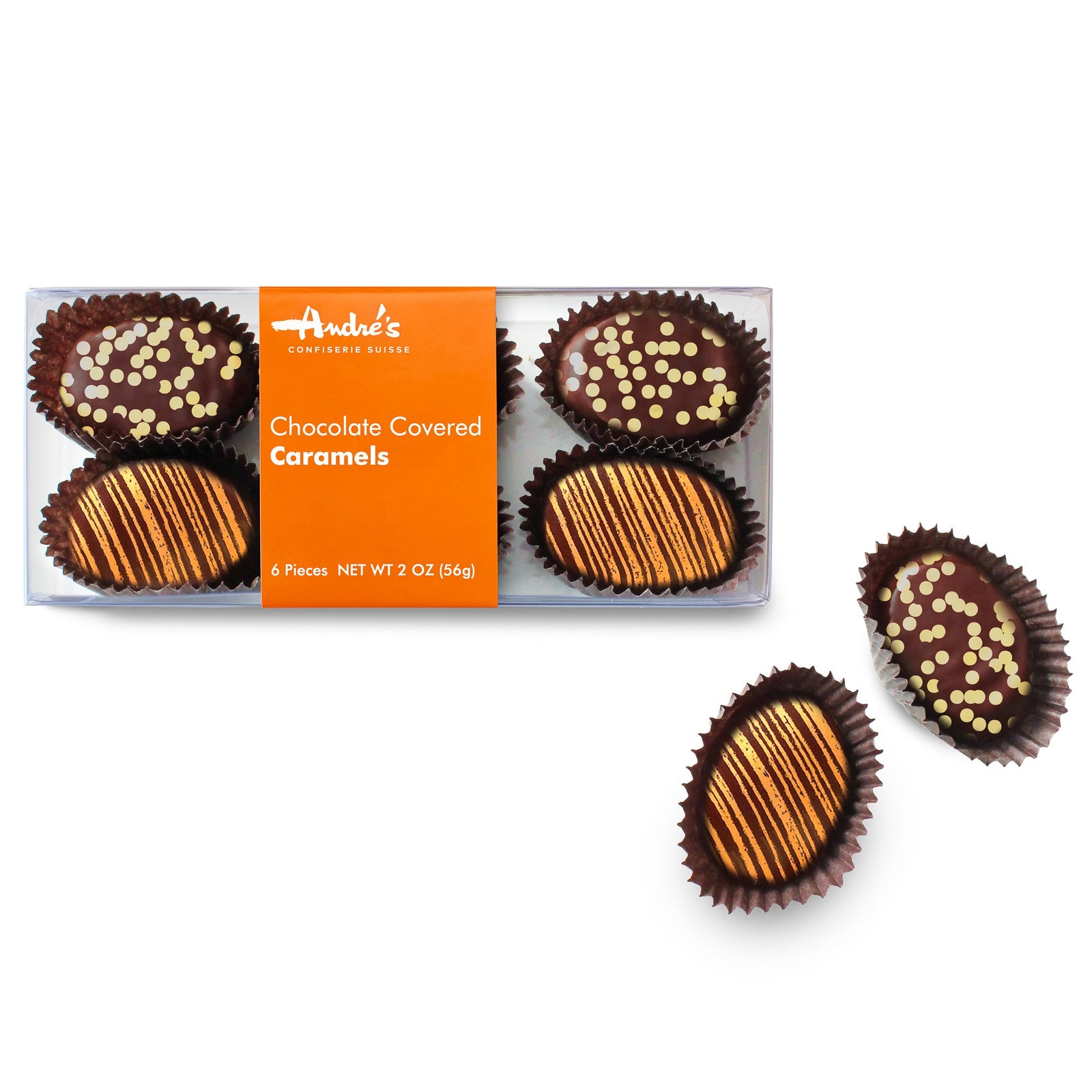 Oval chocolate candies with fall color designs in a clear box with an orange product label. 2 candies are beside the box.