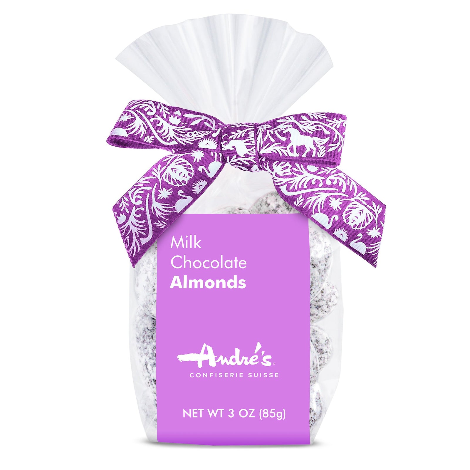 Clear bag containing cocoa powder coated chocolate almonds with a lavender product label and Swiss print bow.