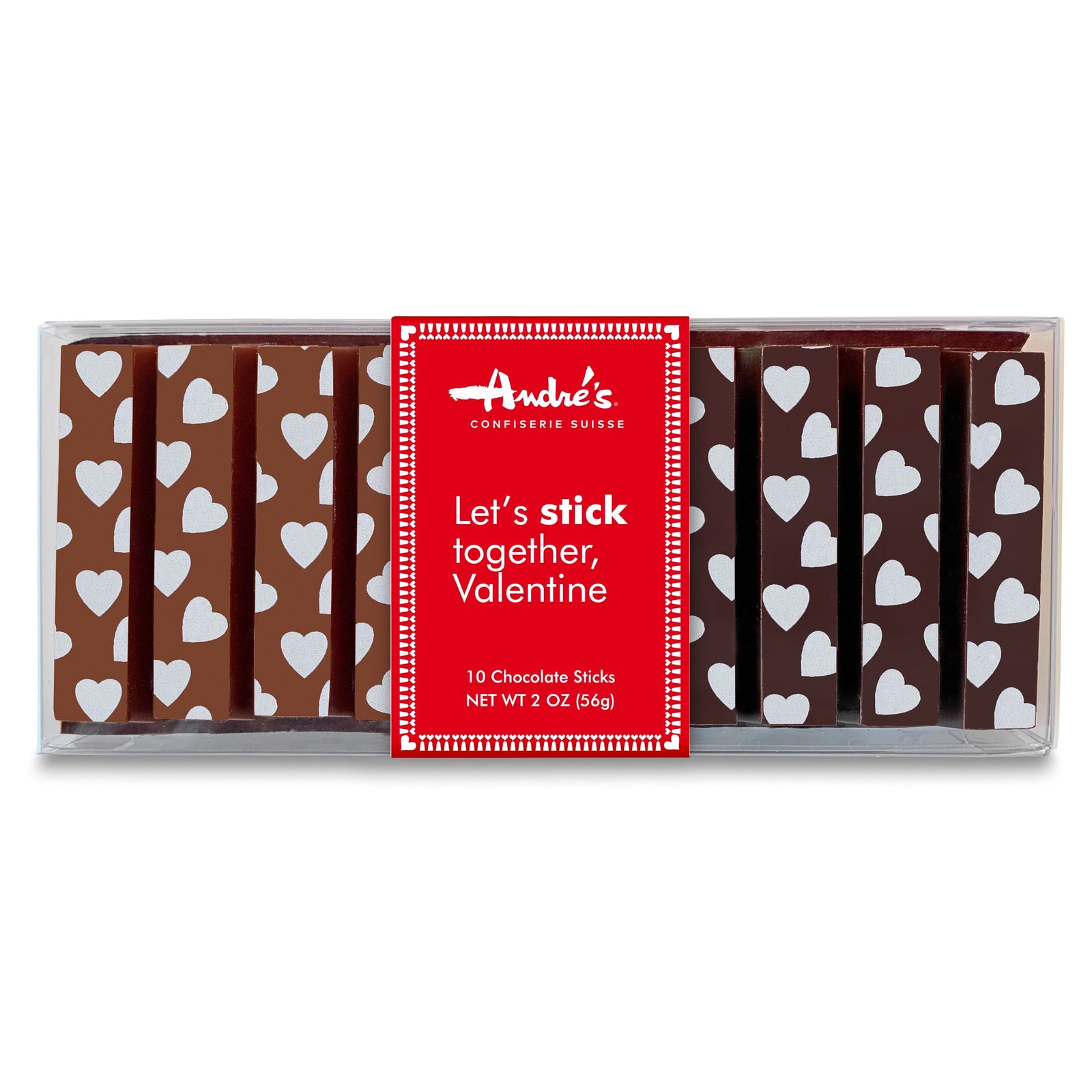 Clear box containing half milk and half dark chocolate sticks that have small white hearts on them, wrapped in a red product label that says "Let's stick together, Valentine".