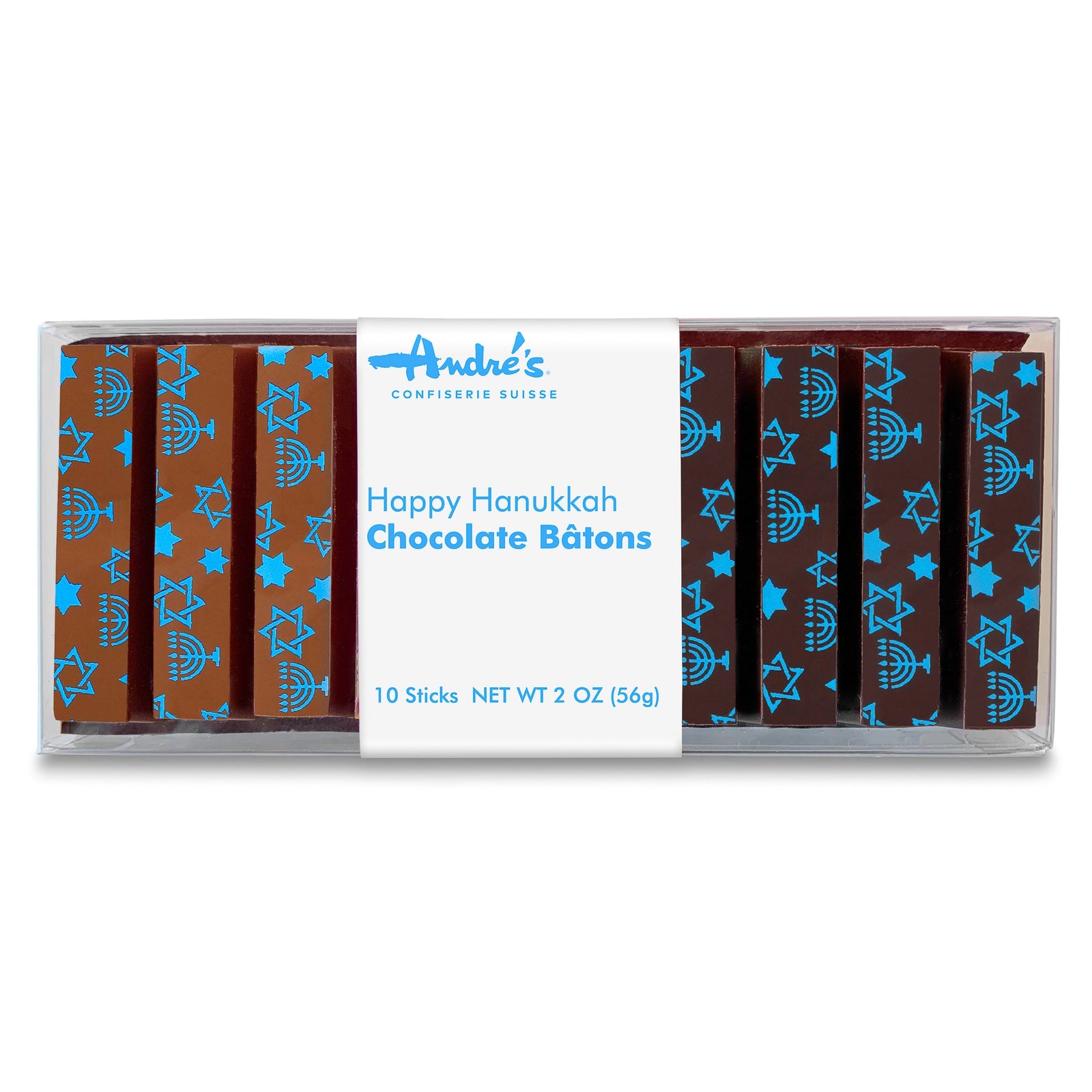 Clear box containing chocolate sticks (half milk, half dark) that have little stars and menorahs printed on them, wrapped with a white product label.