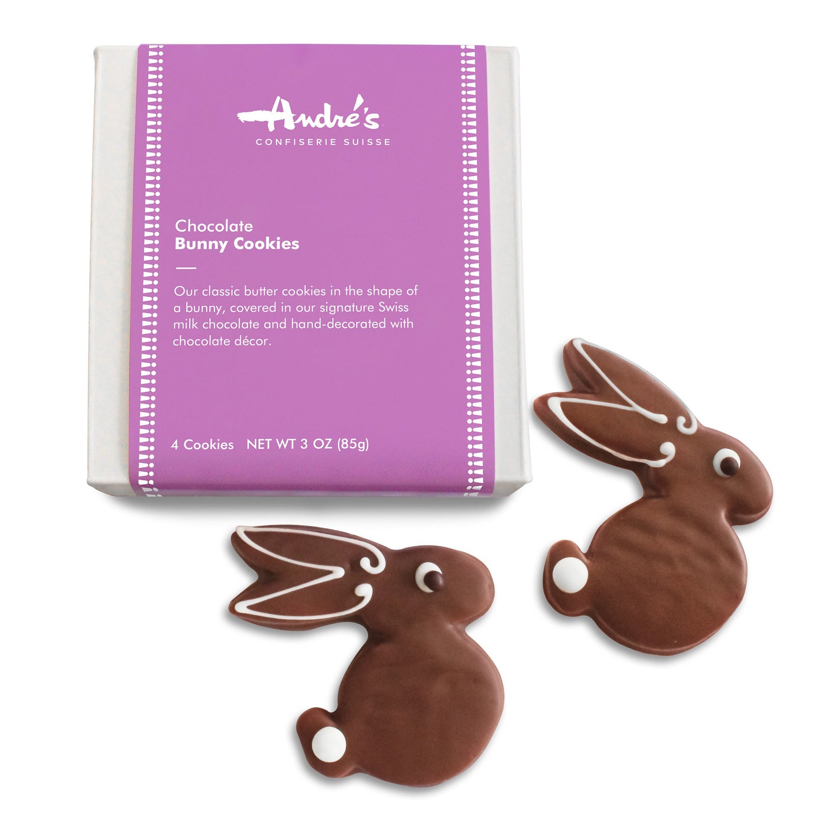 2 little milk chocolate covered bunny shaped cookies with white iced ears, eyes and tail, beside a white box with lavender product label.